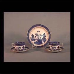 Royal Doulton reproduction of Booths, "Real Old Willow" china.  Seven cups and saucers, three odd cu