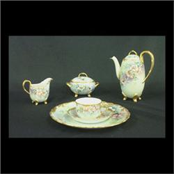 Hand-painted dessert set. Coffee pot, creamer, sugar, eleven cups  and saucers, and twelve dinner si