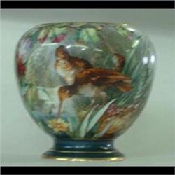 China jardiniere with detailed painting of three water birds  feeding at a pond. They are surrounded