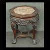 Image 1 : Carved Oriental plant stand, octagonal top with pink marble inset. 18" h x 16" d $150-200