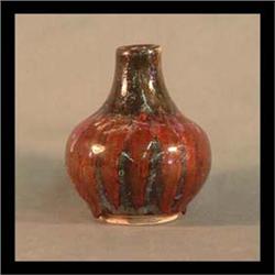Harding black art pottery vase. Dated 1989. Blue and black over red  drip glaze. 5 1/2" tall $200-30