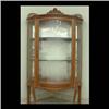 Image 1 : Curved glass oak china cabinet with mirrored back, carved gallery,  S-shaped side glass, bowed front