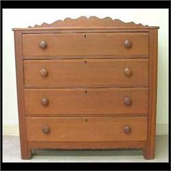 Country Victorian cherry chest of drawers. Scalloped back splash  with four drawers and cut-out skir