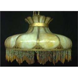 Caramel slag glass hanging lamp with twelve bent panels. 24"d  $300-400