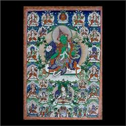 Gouache on ?. Buddhist deities. Tibetian Tanka. Matted and framed.  Inscribed in Ancient Tibetan on