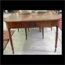 Walnut banquet table, Sheraton style with cherry veneer apron.  Circa 20th century. 30"h x 83 1/2"l