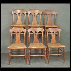 Set of six tiger maple and maple chairs. Caned seats. Mid 19th  century. Note some older repairs and