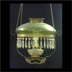 Victorian hanging lamp with green Loetz type shade in a brass  frame. Green shade with applied burga