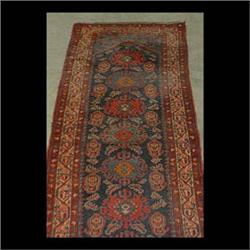 Oriental runner. Hamadan with eight repeating central medallions on  a dark blue ground. Note end bo