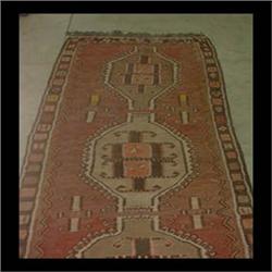 Oriental Kilim. Three joining center medallions with latchhook  borders in camel colors, pinks, and