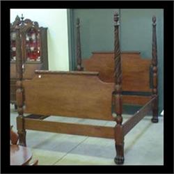 Mahogany Empire style poster bed. Posts are carved and turned with  acanthus leaf decoration, topped