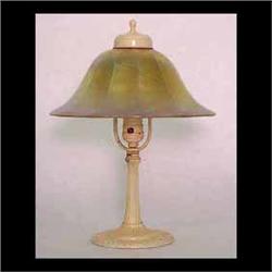 Lamp with gold iridescent art glass shade. Fitter ring has been  ground. 10 1/2" d X 14" h $300-500