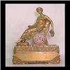 Image 1 : Bronze French figural clock. Classical style with seated female  figure and a clock below, mounted o