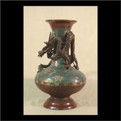 Japanese cloisonne vase with bronze dragon around neck. Marked made  in Japan on base. 14 1/2" tall