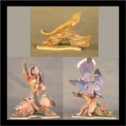 Boehm bird figures. Pair of Bluejays and fledglings with  strawberries and a lizard. #466 signed. Ma