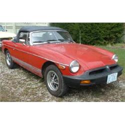 1980 MGB convertible with 32,000 original miles. Carmine color with  silver striping, hard and soft