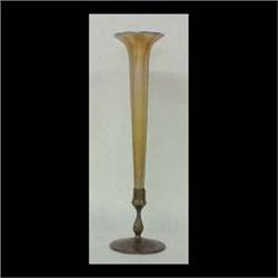 Tiffany gold Favrile trumpet vase in a bronze holder. Vase is  signed L.C.T. Favrile. Base is signed
