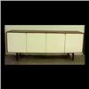 Image 1 : Florence Knoll credenza. Four white lacquered doors with chrome  plated pulls, walnut veneer case, a