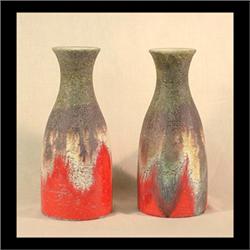 Pair of Fantoni carafe-shaped vases. Green, brown, and yellow glaze  over red. 10" $200-300