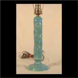 Cowan art pottery lamp. Molded floral decoration with a light green  over turqoise glaze. Impressed