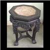 Image 1 : Carved Oriental plant stand; octagon top has pink marble  inset. 19"h x 14"d $150-200