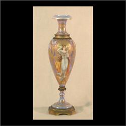 Sevres urn with art nouveau woman surrounded by gilt florals.  Bronze mounts. No lid. 11 1/2" tall $