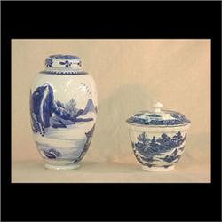Two items: covered jar, Ming K'ang Hsi. China 1662-1722. Blue and  white decoration of Oriental land
