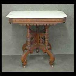 Victorian marble-topped table. White marble with an ornate  transitional Renaissance base. 30" h X 3