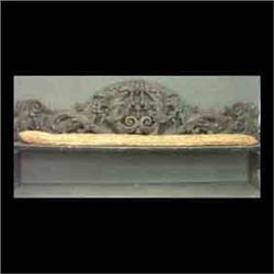 Heavily pierce-carved bench with floral swags and scrolling on   back.Probably an early 19th century