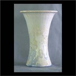 Pisgah Forest Crystaline glaze trumpet form vase. Cream shading to  blue at base. Pink interior. Fai