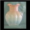 Image 1 : Victorian art glass pitcher. Pink shading to clear with reeded  handle and crimped top. Note some st