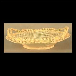 Belleek basket with woven open work and twig handles, florals  along rim. Note some minor damage.  3