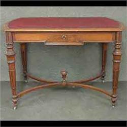 American Victorian writing desk. Renaissance revival style. Walnut  with a single drawer. Turned and