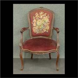 Louis XV style arm chair with floral needlepoint back. Note repair  where right arm joins back. 36 1