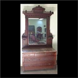 Carved American Victorian dresser, Eastlake style walnut with pink  marble top. Carved cornice and d