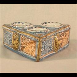 Talavero, redware triangular shape dish with three wells, lion head  prunts, Italian. Note surface w