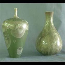 Two contemporary Art pottery vases with crystaline glaze. One has a  bulbous base with tapered neck,
