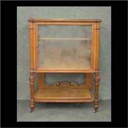 Victorian display cabinet. Walnut with cookie corners and fluted  columns supported by turned and fl