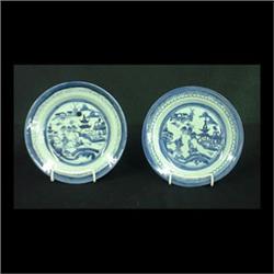 Five Canton luncheon plates. Circa 1840. Bridge, boat, pagodas,  trees, and clouds around edge. Note