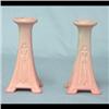 Pair of Rookwood candlesticks with a pink matte glaze. 7"h $150-250