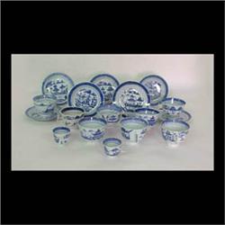 Canton cups and saucers: seven saucers; seven cups; two demitasse  cups; and one cream soup cup. Cir