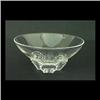 Clear glass bowl, attributed to Steuben. The bowl has a free form,  asymmetrical rim, and sits on a