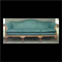 Camel back sofa carved frame Chipendale style cabriol legs dark  blue-green upholstery. Circa 1920.