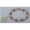 Image 1 : MULTISTONE SILVER/GOLD PLATED HEART BRACELET