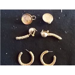 Pair of Gold Colored Earrings