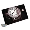 Image 1 : Photograph of Christopher Lloyd as "Doc Brown" in front of the clock from Back to the Future III