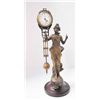 Image 1 : Figural swing clock with "Classical Female"