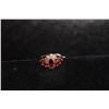 Image 2 : 14 K YELLOW GOLD RING WITH LARGE CENTER MARQUIS GARNET AND 10 SIDE GARNETS WITH SMALL DIAMONDS SIZE 