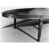 Image 1 : A large oval-shaped mahogany board room table