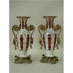 A pair of 19th century cased glass vases, ...